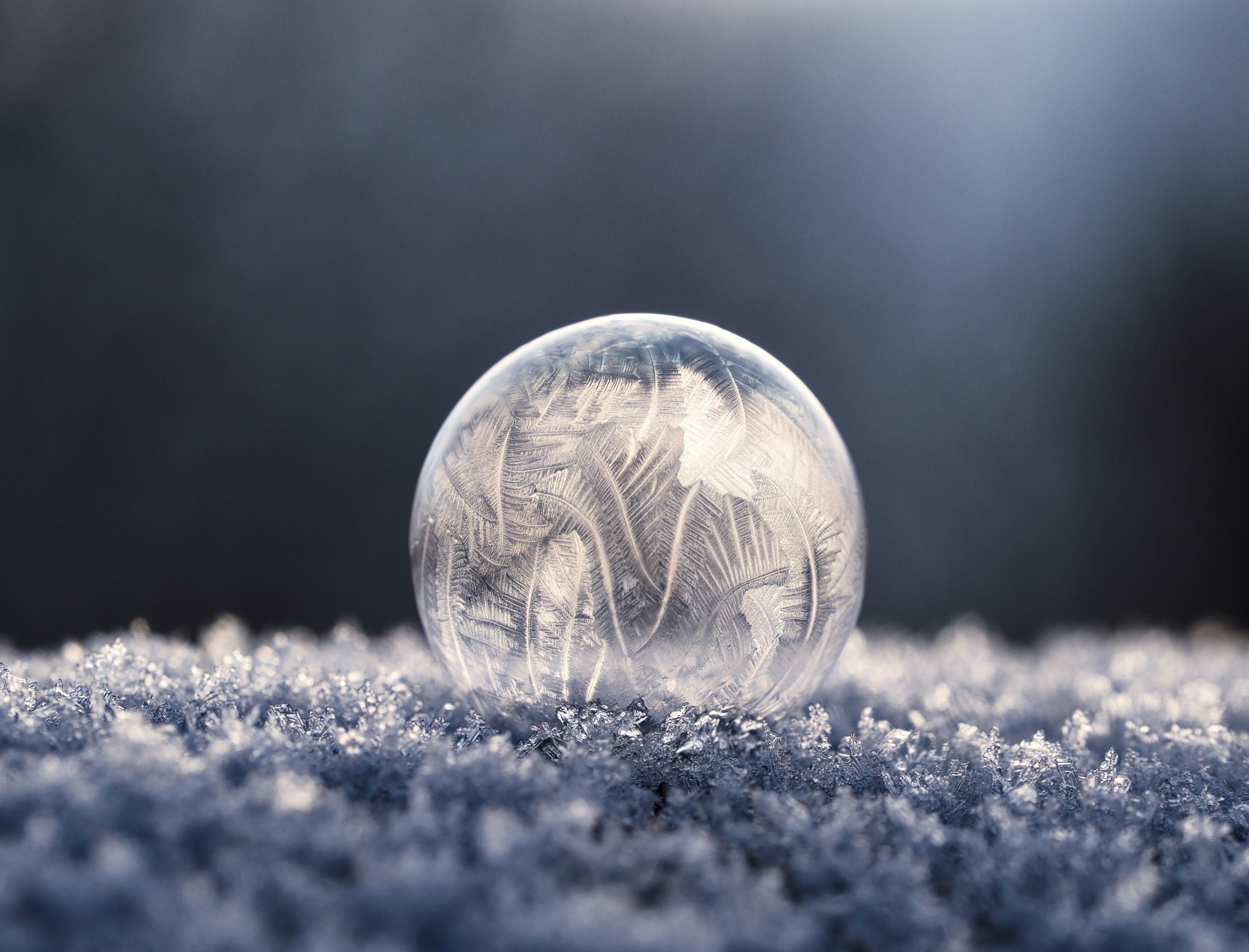 Perfect sphere made of ice with interesting texture